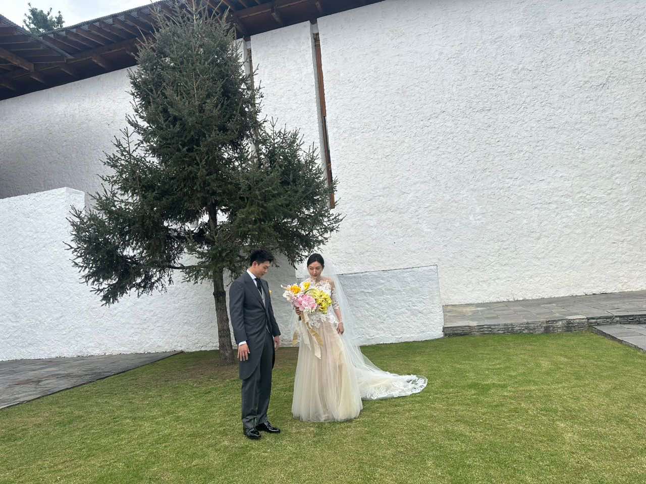 Buddhist monks in traditional red robes at a monastery